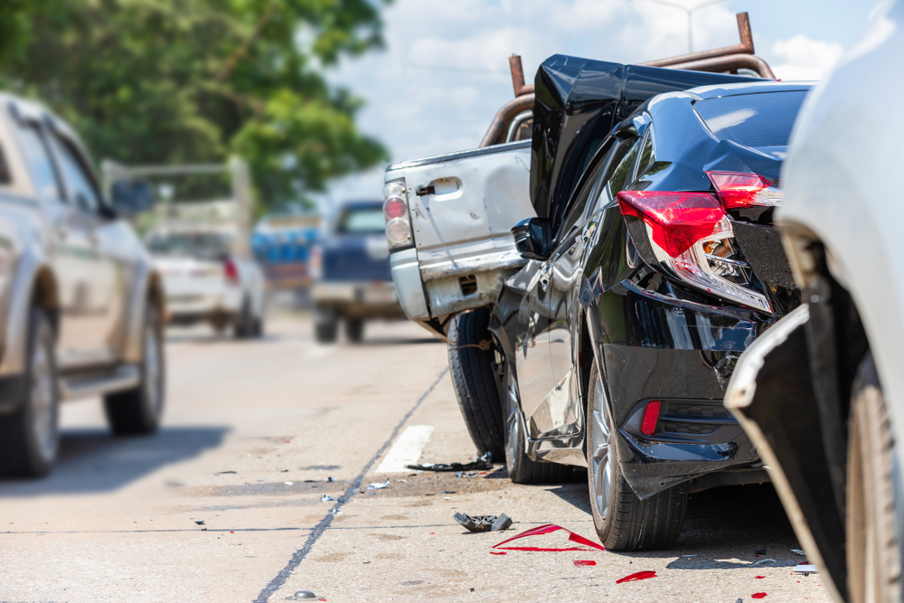 Driver calls police after a hit-and-run accident, documenting the scene and gathering evidence for a claim.